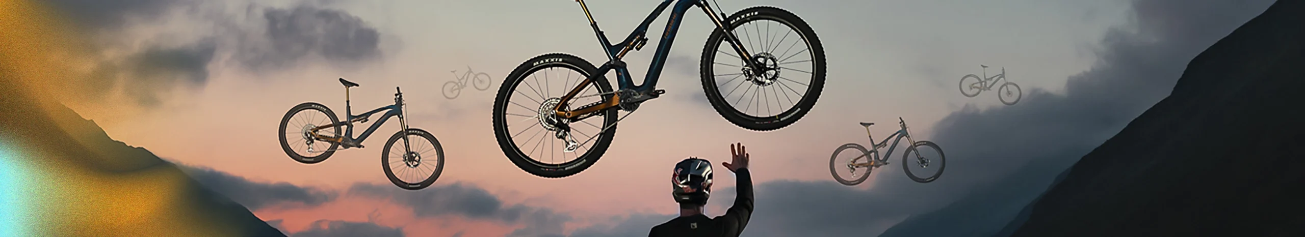 Haibike elcykel svävar i luften och en professionell förare försöker nå den